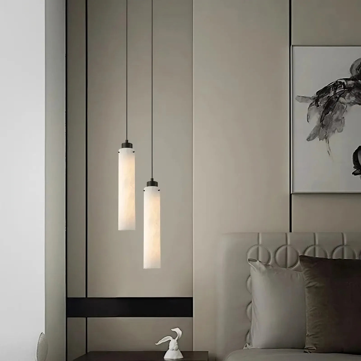 Noir black marble pendant illuminated over a kitchen island