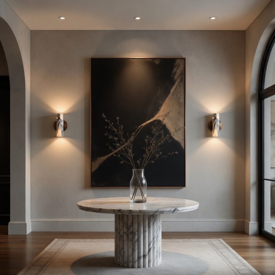 Moonshade marble wall sconce with glowing round stone shade