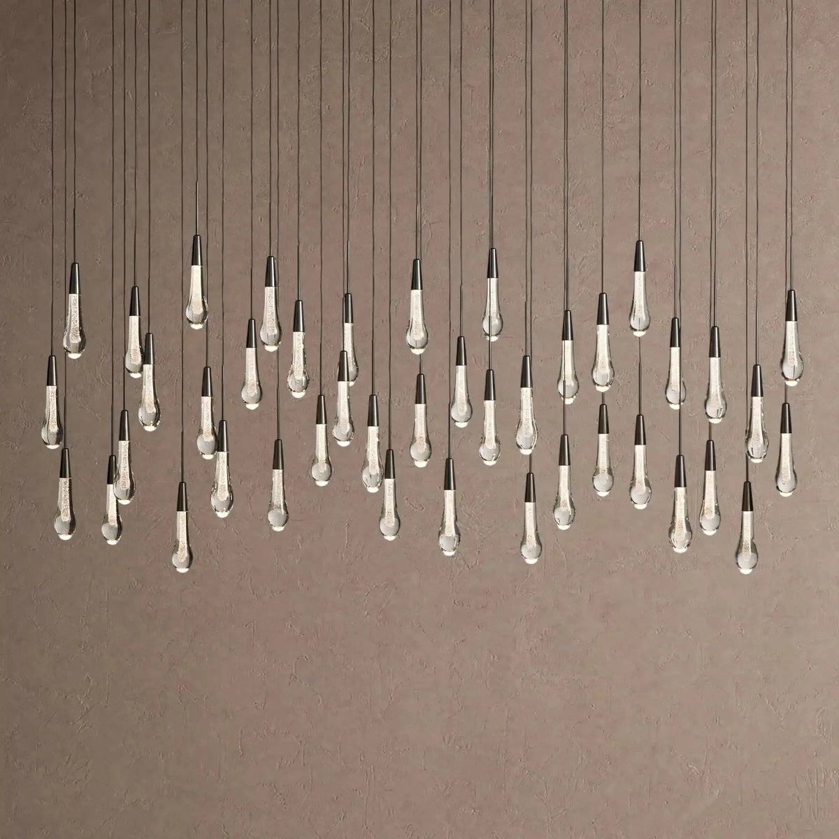 Soltaire Linear Chandelier - Raindrop Pendant Lighting - 70” 42-LightBlackcasivra