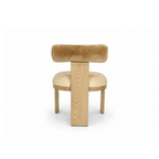 Yucca Dining Chair featuring leather seat and Cylindrical bolster backrest