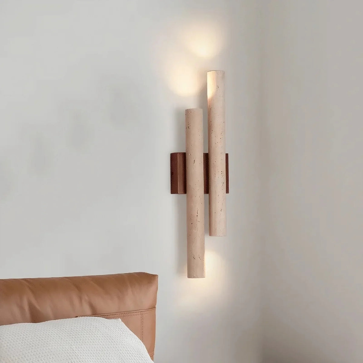 Toscana travertine wall light with warm glowing shade