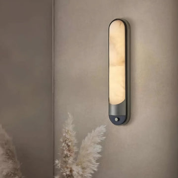 Sandford marble and stainless steel wall sconce in a hallway