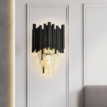 Vigo crystal wall sconce by Morsale.com, clear crystal on a black stainless steel frame casting warm E14 LED light.